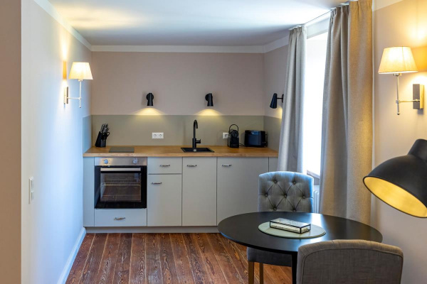 Jede Einheit hat eine eigene Kitchenette. Hier können Sie sich jeden Morgen ungestört Ihren ersten Kaffee zubereiten.